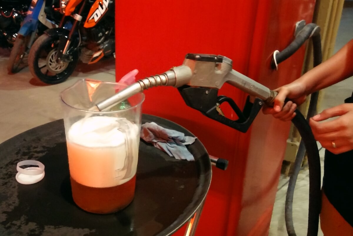 FUEL UP! This Cafe Racer "gas pump" loads beer by the pitcher. (Photo by Max Limpag)