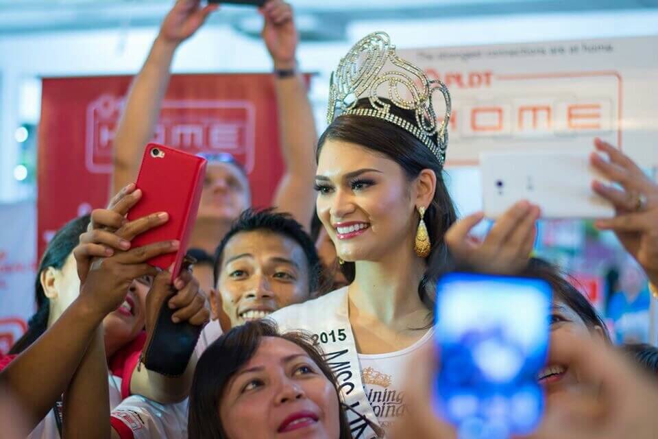 PLDT ambassador Pia Wurtzbach brings Home Miss Universe crown