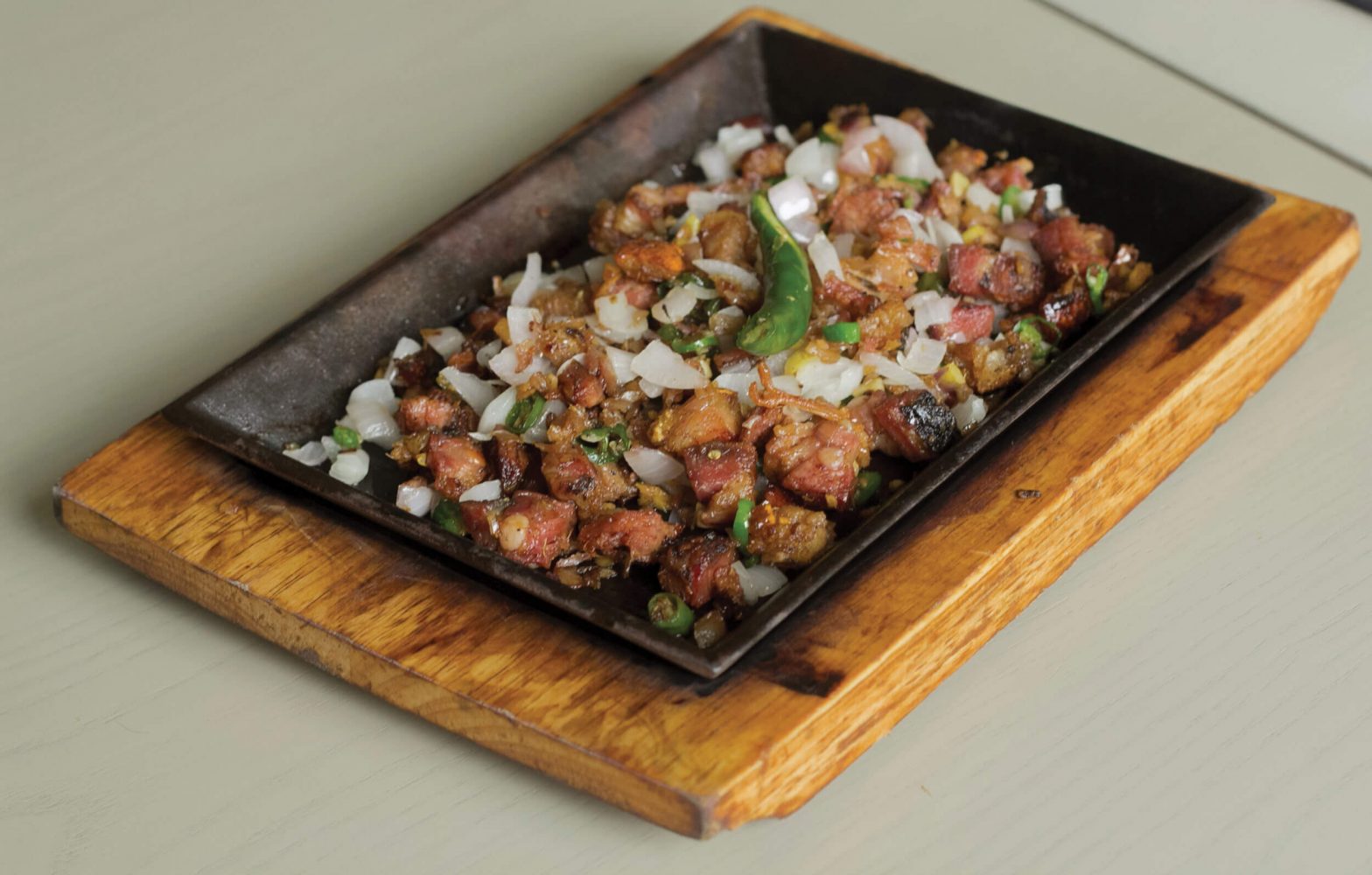 Lechon paksiw, sisig, scallops now on the menu at Hukad, Golden Cowrie