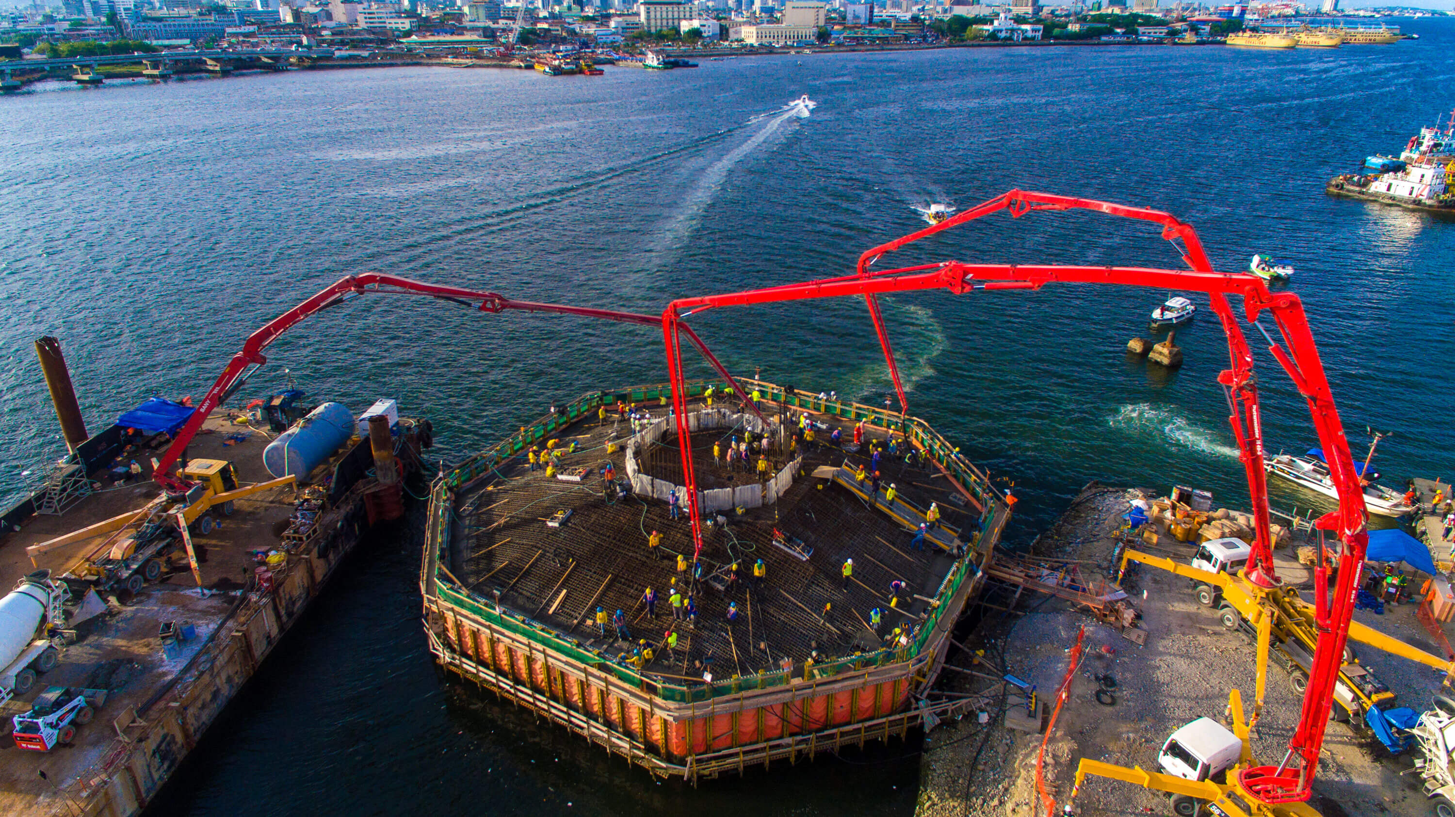 CONCRETE POURING. The photo above shows Tower 2 2nd stage concrete pouring.