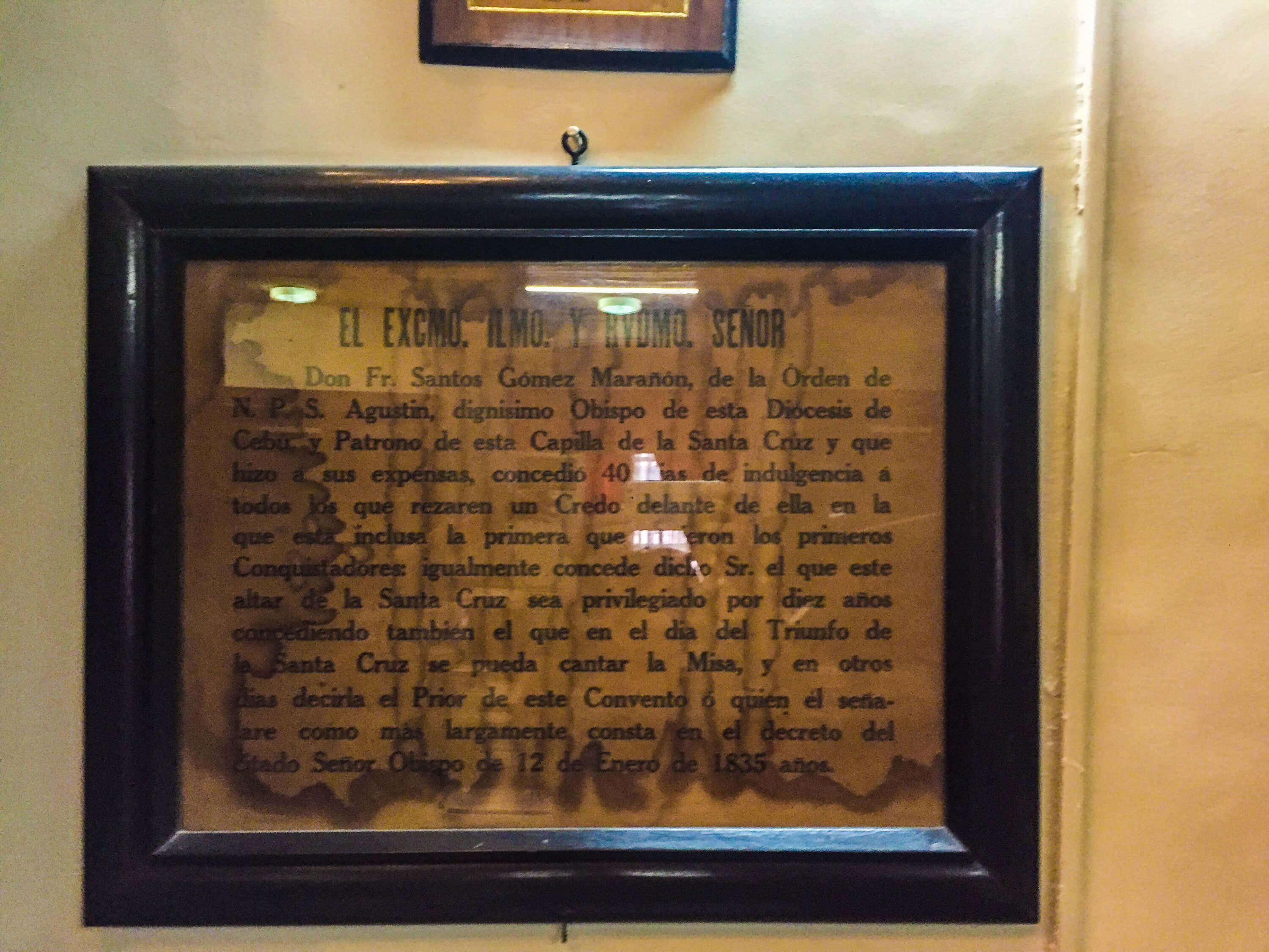 PLENARY INDULGENCE. This framed document found in the basilica library is the actual plenary indulgence granted by Cebu Bishop Santos Gomez Marañon for the Magellan’s Cross.