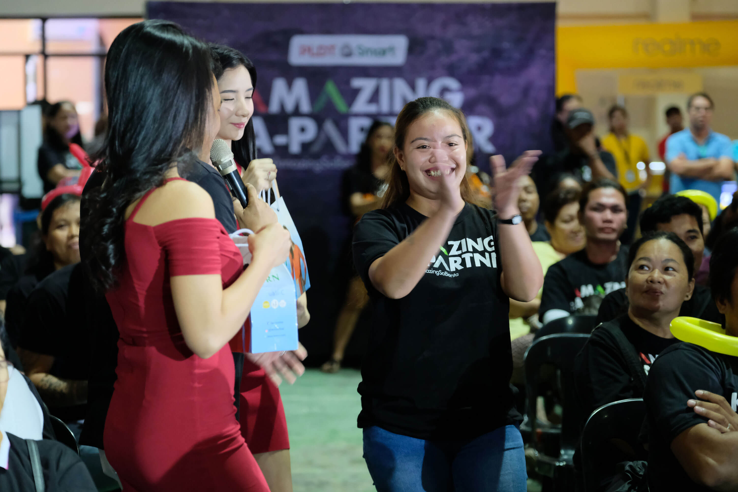 A lucky Ka-Partner retailer wins a raffle prize during the convention in Leyte.
