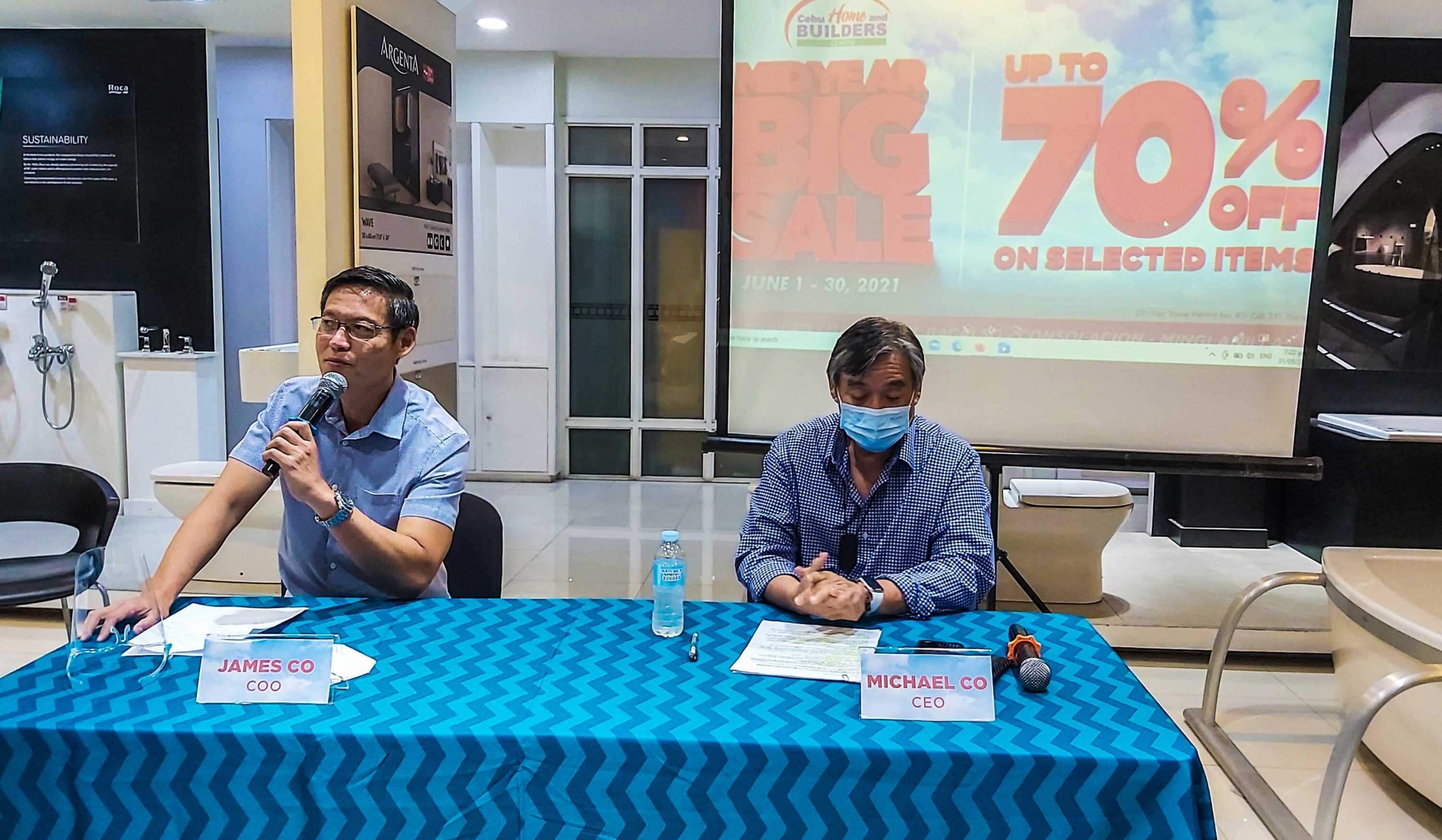 MIDYEAR BIG SALE. Cebu Home and Builders Centre COO James Co answers questions about their sale during a press conference. With James is CEO Michael Co.