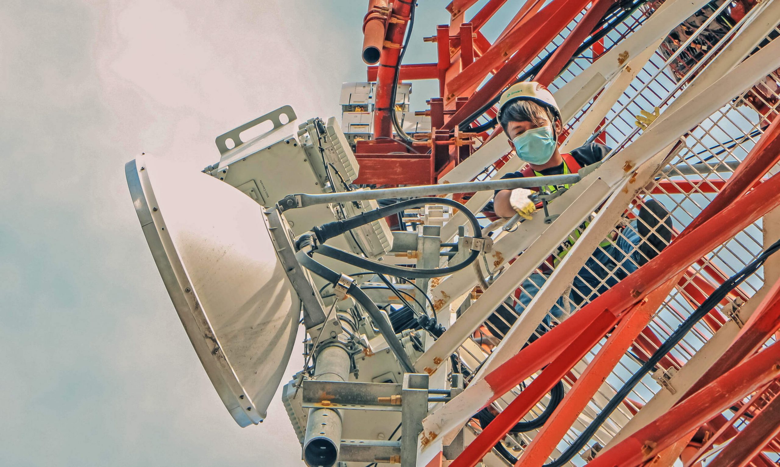 Mark Lumame, a Smart Engineer from North Luzon, re-pans equipment attached to the site serving Cordova, Cebu.