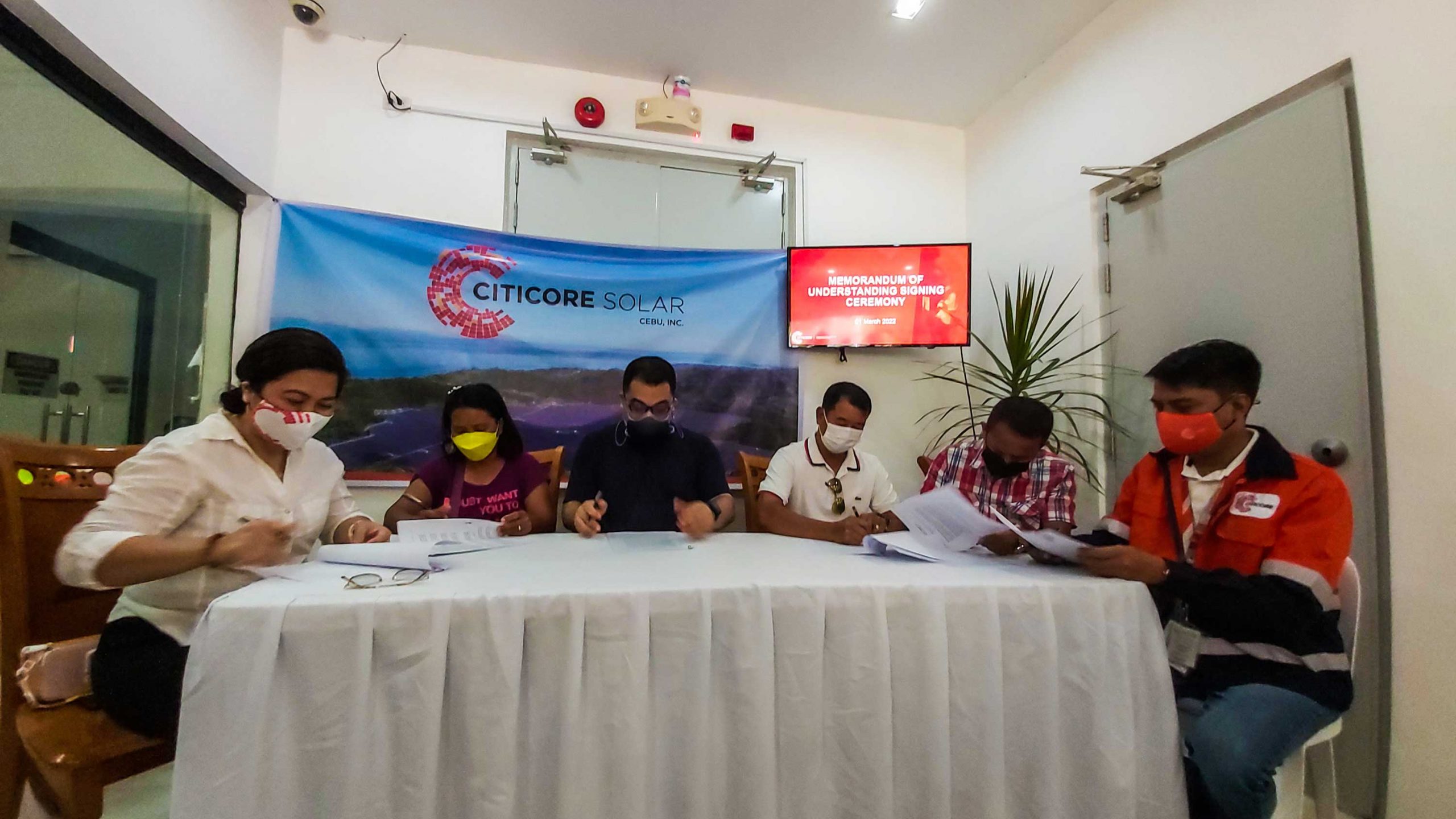 AGREEMENT. Signing of the agreement for the project are (from left) Maricris Cabalhin, Citicore Corporate Affairs Head; Marina Canillo, representative from Talavera United Farmers Association; Jason Torres, Megawide VP of Corporate Affairs; Brgy. Talavera Captain Edgar Dejito; Pastor Zosimo Potot, LAMBO Carbon representative and LAVO Seaside President; and Engr. Rey Matugas, Operations and Maintenance Manager.