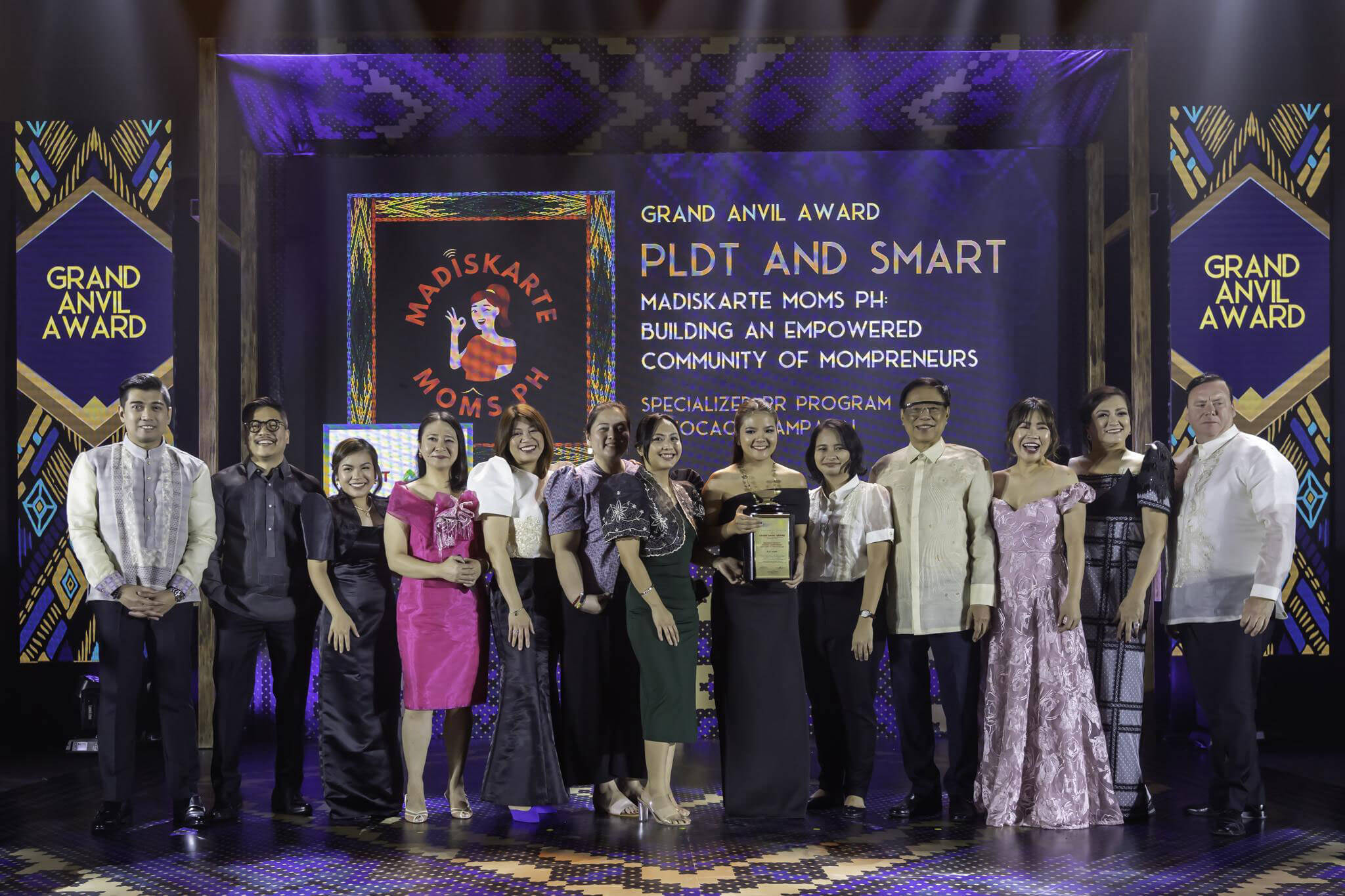 PLDT Home’s Madiskarte Moms PH community won the Grand Anvil Award. In this photo (L-R): PRSP President Harold Geronimo, Stratworks, Inc. Managing Director Mark Christian Parlade, PLDT Home Head of Digital Content Marketing Mabie Encarnacion, PLDT Home Manager for Fixed Wireless Postpaid Kat Yulo, PLDT Home AVP and Head of Digital Services Janice Lagaso, PLDT Home Senior Manager for Marketing Communications Linette Garcia-Perez, PLDT Home Product Manager for Entertainment Tin Rementilla,  PLDT Home PR Manager and Community Lead for MMPH Daphne Gripal, PLDT Home Digital Marketing Specialist Elaine Lara, Former Secretary of Trade and Education, Former DTI and DepEd Secretary and Alliance Global Group Independent Director Jesli A. Lapus, PLDT Home AVP and Head of Public Relations and Influencer Management Cheryl Maxine Loyola, PRSP Trustee and Chairperson 58th Anvil Awards Georgina “Joji” Banzon, and Global Alliance for Public Relations and Communication Management President and CEO Justin Green.