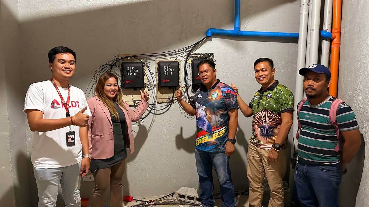FIBERING UP ESCALANTE CITY. (From left) The symbolic powering up of the PLDT Network Access Point (NAP) in Escalante City Hall was led by John Delarmente, PLDT CX Service Delivery Associate; Mae Agnes Legaspina, PLDT Relationship Manager Executive III; Anastacio Rabago, Department Head of Escalante City General Services Office (GSO); and Atty. Edwin Villamor, City Admin of Escalante City.