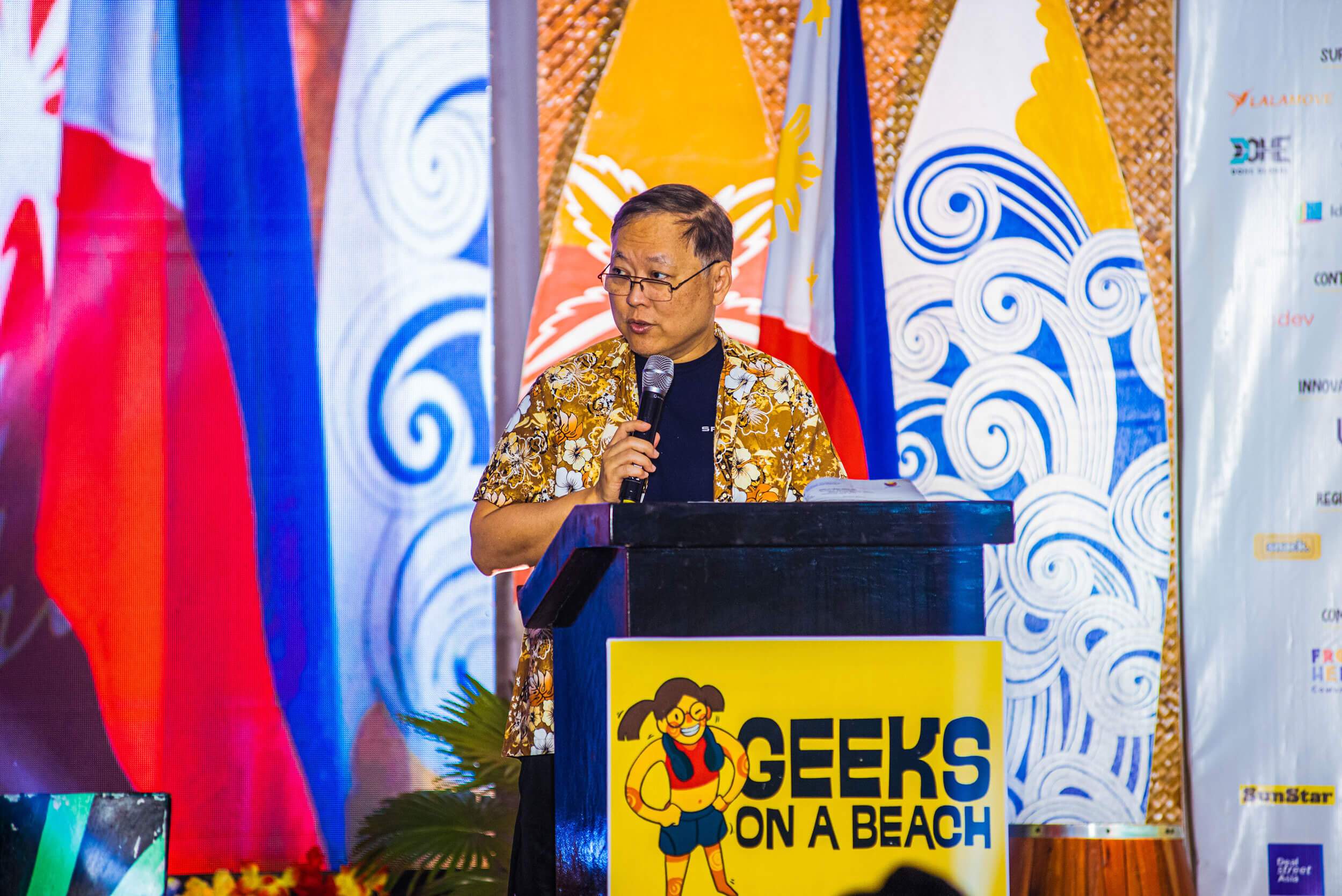 Department of Information and Communications Technology Secretary Ivan John Uy speaks during the opening of Geeks On A Beach in Panglao, Bohol.