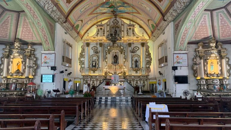REPLICAS. The retablo of the San Guillermo de Aquitana parish church in Dalaguete now contains replicas of the Santo Tomas de Villanueva and San Juan de Sahagun. (PHOTO BY ALBERT ONG)